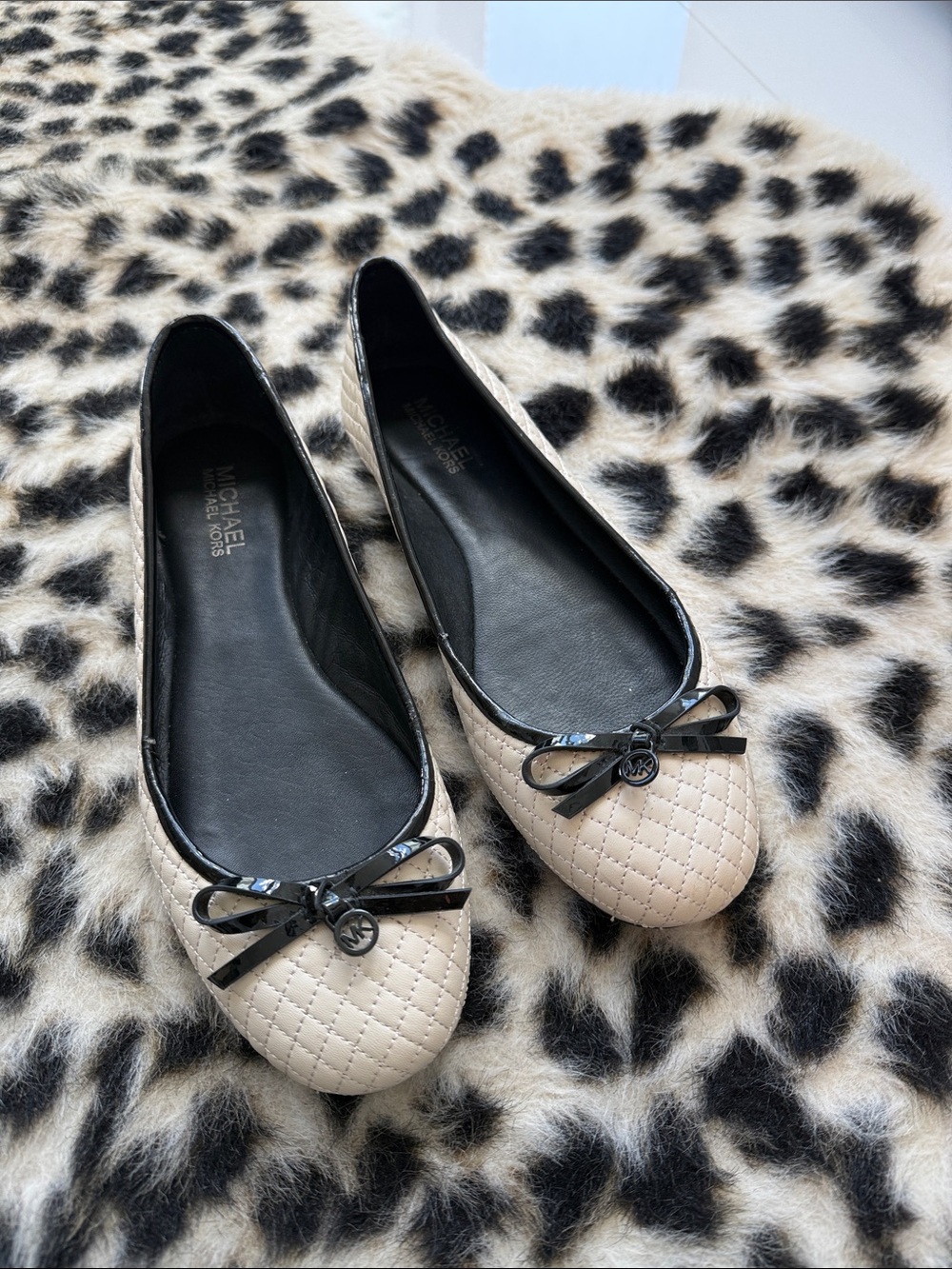 MICHAEL Michael Kors Quilted Beige Ballet Flats with Black Trim and Bow